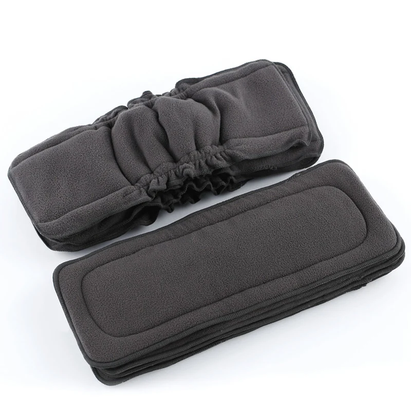 Pampers Diaper Premium Care - Tapis à langer réutilisable en charbon